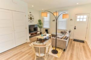 a living room with a couch and a table at Shore Thing in Atlantic City