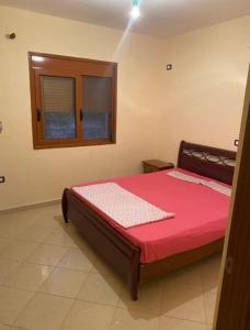 Vila Rosis tesisinde bir odada yatak veya yataklar