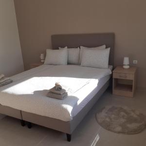 Postel nebo postele na pokoji v ubytování Apartman 4L