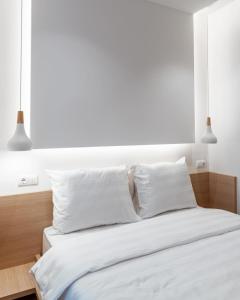 Postel nebo postele na pokoji v ubytování ZLATNI JAVOR 312