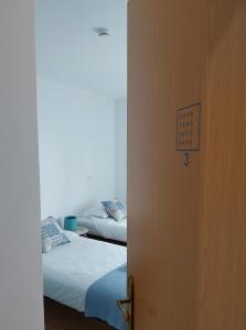 Postel nebo postele na pokoji v ubytování EsposendeGuesthouse