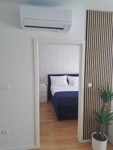 Postel nebo postele na pokoji v ubytování Salona Lux