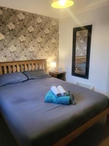 Giường trong phòng chung tại The mill wheel +4 ảnh