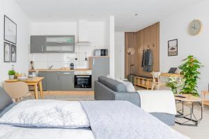 Kuchyň nebo kuchyňský kout v ubytování Apart4me Modern Apartment Geislingen zentral mit Parkplatz + 36 fotografií