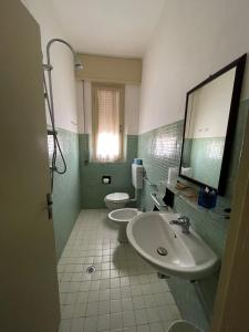 Koupelna v ubytování Hotel Helvetia