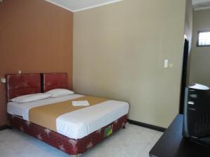 Katil atau katil-katil dalam bilik di Pakuna Beach