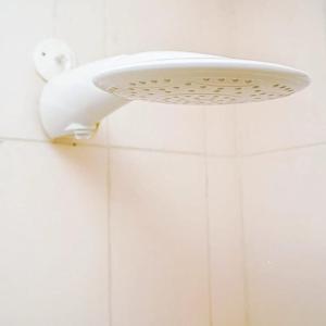 a white light on the wall of a bathroom at Sofitel Executive 4 bedrooms Milimani in Kisumu