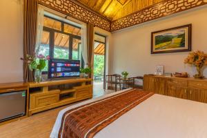 TV/Unterhaltungsangebot in der Unterkunft Tam Coc Serenity Hotel & Bungalow