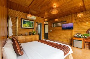 Ein Bett oder Betten in einem Zimmer der Unterkunft Tam Coc Serenity Hotel & Bungalow