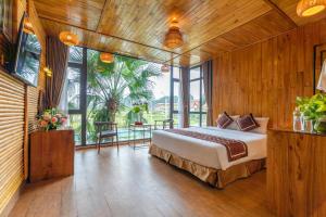Postel nebo postele na pokoji v ubytování Tam Coc Serenity Hotel & Bungalow + 37 fotografií
