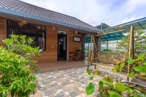 Ein Garten an der Unterkunft Tam Coc Serenity Hotel & Bungalow