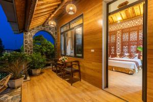 Ein Bett oder Betten in einem Zimmer der Unterkunft Tam Coc Serenity Hotel & Bungalow