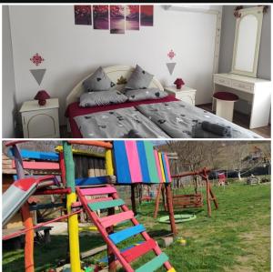 a bedroom with a bed and a playground with a ladder at Szofi Vendégház in Kereki +37 photos