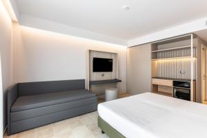 Postelja oz. postelje v sobi nastanitve Hotel Netum Mare