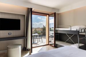 Postelja oz. postelje v sobi nastanitve Hotel Netum Mare
