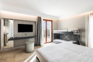 Postelja oz. postelje v sobi nastanitve Hotel Netum Mare