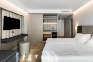 Postelja oz. postelje v sobi nastanitve Hotel Netum Mare