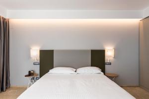 Postelja oz. postelje v sobi nastanitve Hotel Netum Mare