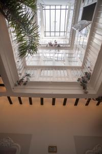 an overhead view of a room with a ceiling at Palacete de La Alameda - Adults Only- in Cádiz