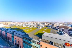an aerial view of a city with buildings at Magnifique duplex Cosy Gare Terrasse 4Pers in Argenteuil