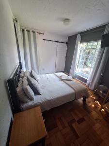 Postel nebo postele na pokoji v ubytování Die Eend Studio