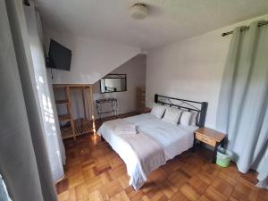Postel nebo postele na pokoji v ubytování Die Eend Studio