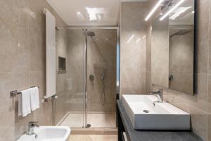 Kopalnica v nastanitvi Hotel Netum Mare