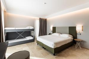Postelja oz. postelje v sobi nastanitve Hotel Netum Mare