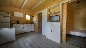 Kuchyň nebo kuchyňský kout v ubytování Le chalet de DOMY