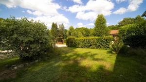 Zahrada ubytování Le chalet de DOMY