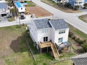 an aerial view of a white house with a porch at Beach Star Villa in North Topsail Beach