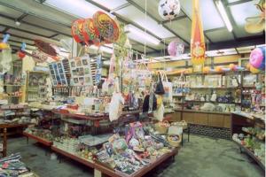 a store filled with lots of items on display at Nisshokan in Ise