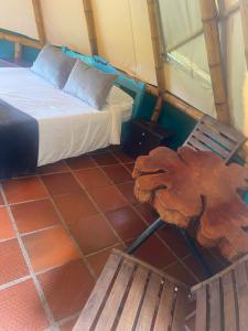 Postel nebo postele na pokoji v ubytování Glamping El Establo