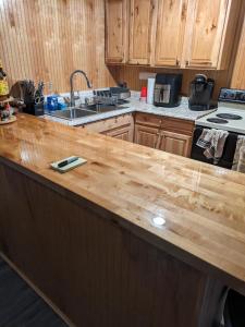 a kitchen with a wooden counter top at ECLIPSE Vermont in Colchester