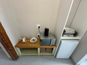 Η κουζίνα ή μικρή κουζίνα στο Southernwood nest +5 φωτογραφίες