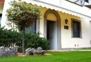 Vonkajšia záhrada v ubytovaní Gemelli Hotel