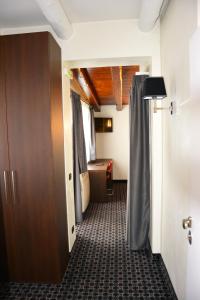 Posteľ alebo postele v izbe v ubytovaní Gemelli Hotel