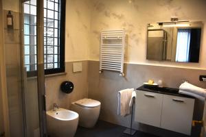 Kúpeľňa v ubytovaní Gemelli Hotel