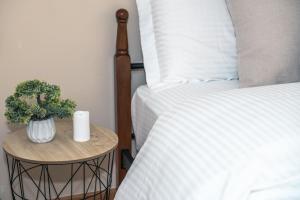Postel nebo postele na pokoji v ubytování Zafeiropoulos Apartments
