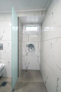 Koupelna v ubytování Zafeiropoulos Apartments