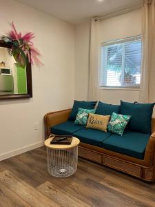 a living room with a couch and a table at Stunning Little Havana Suites Close to Calle Ocho, Brickell and Wynwood and 10 mins to the Beaches - Free Parking in Miami
