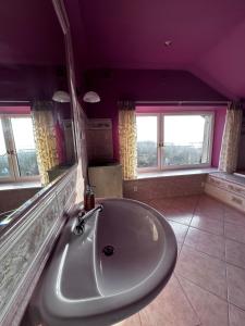 Koupelna v ubytování Willa Wicko - Międzyzdroje - apartamenty z aneksem - widok na Zalew Szczeciński