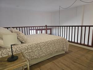 Una cama o camas en una habitación de APARTMENT IN THE CENTER OF THE OLD TOWN.