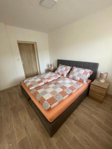 Postel nebo postele na pokoji v ubytování Apartmány Ferie