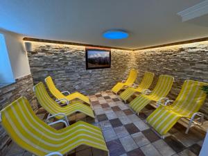 Telewizja i/lub zestaw kina domowego w obiekcie Appartements Olympia
