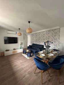 TV a/nebo společenská místnost v ubytování Apartamentos Amanecer