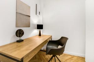 Μια τηλεόραση ή/και κέντρο ψυχαγωγίας στο Gemütliches Apartment/ Ruhrpark +4 φωτογραφίες