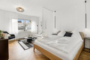 Ένα ή περισσότερα κρεβάτια σε δωμάτιο στο Gemütliches Apartment/ Ruhrpark