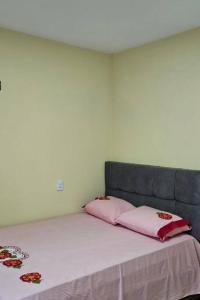 Ένα ή περισσότερα κρεβάτια σε δωμάτιο στο Casa em Flecheiras