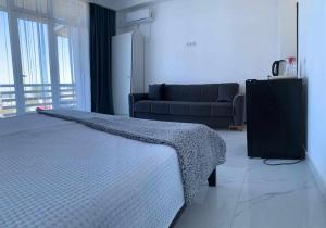 Voodi või voodid majutusasutuse Kolkhi Guest House toas